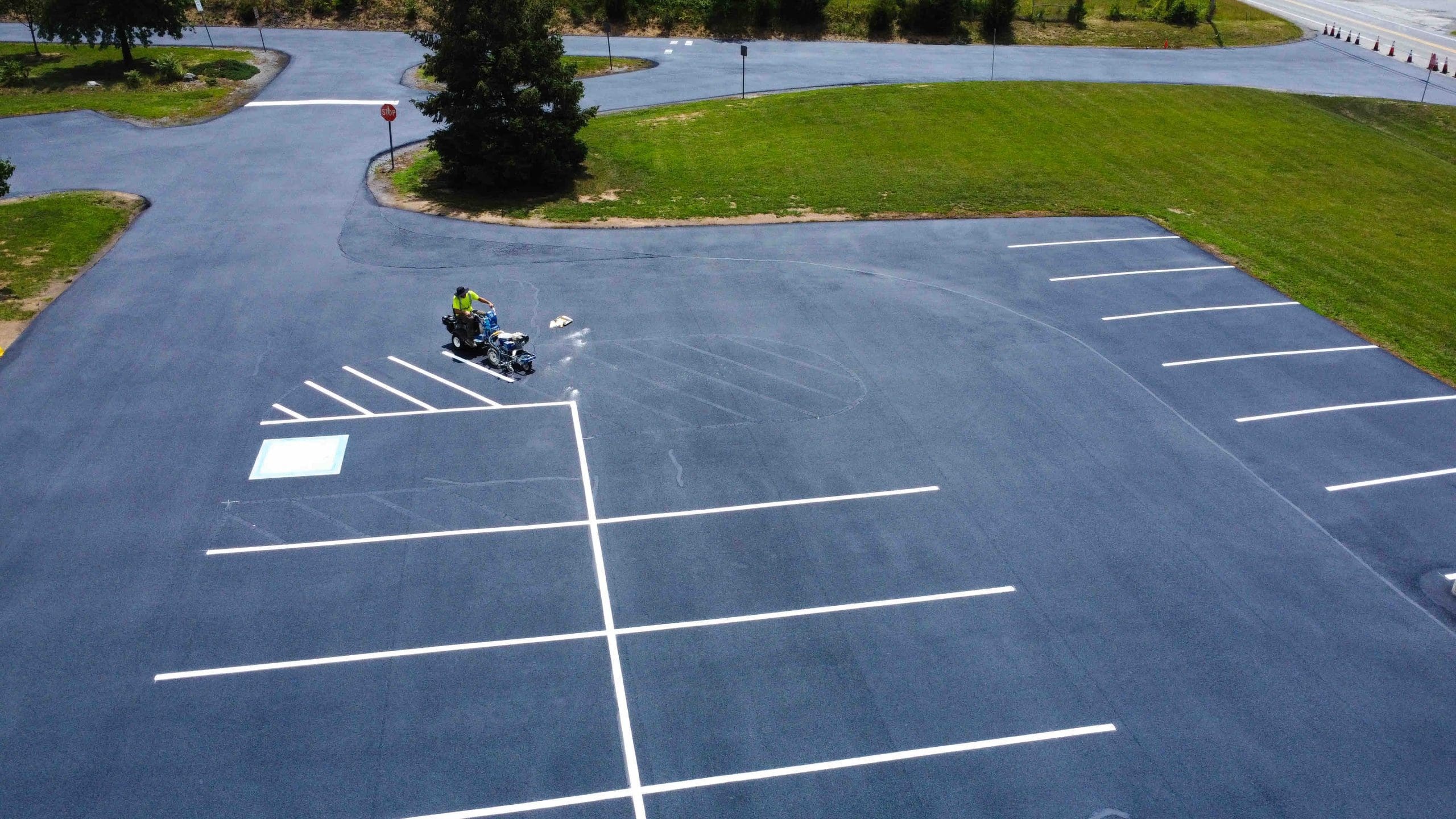 Well-maintained commercial parking lot aerial view